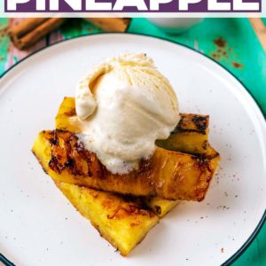 A plate of honey grilled pineapple and ice cream with a text title overlay.