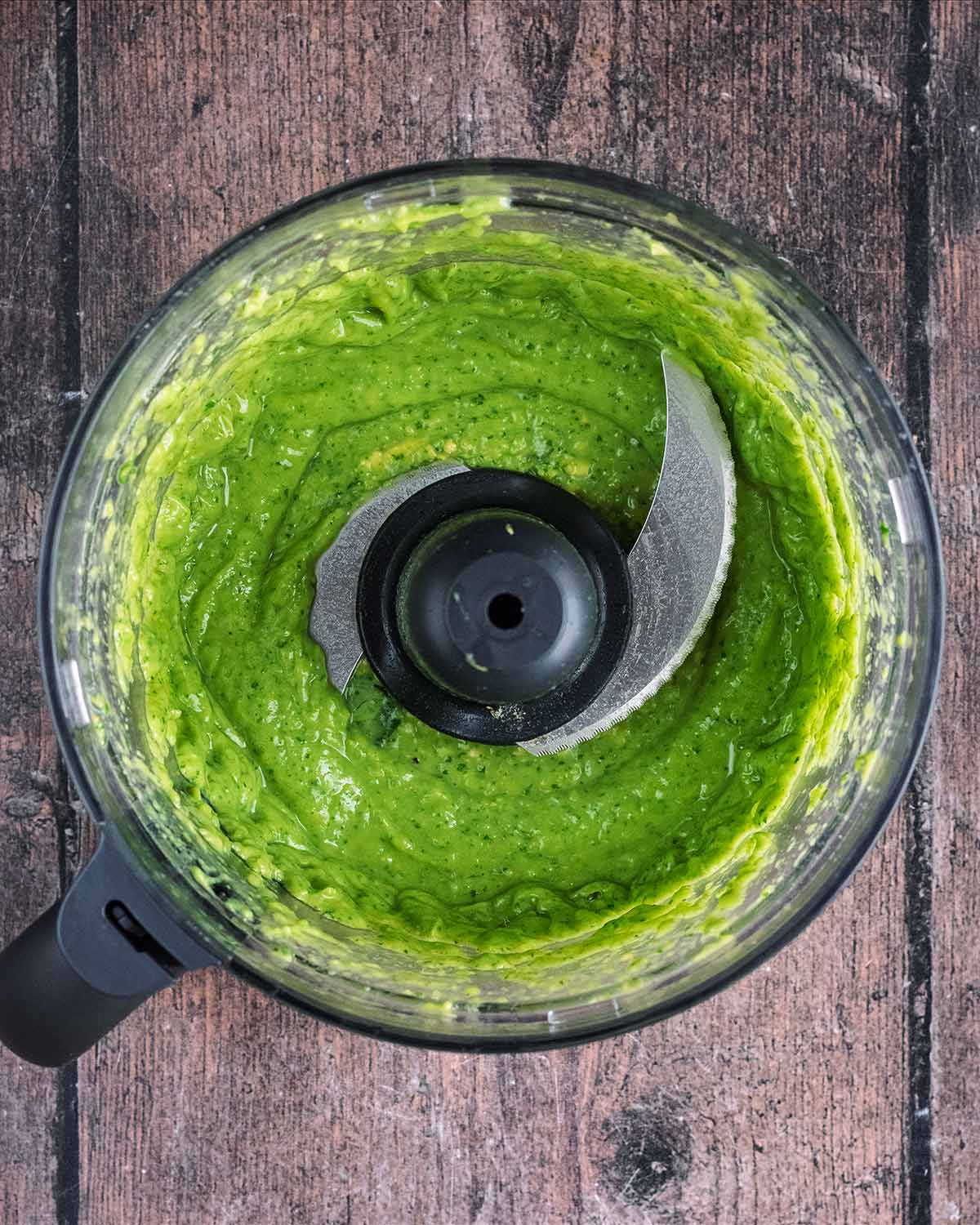 Everything blended together to make a creamy green sauce.