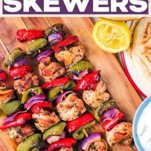 Four chicken and vegetable skewers with a text title overlay.