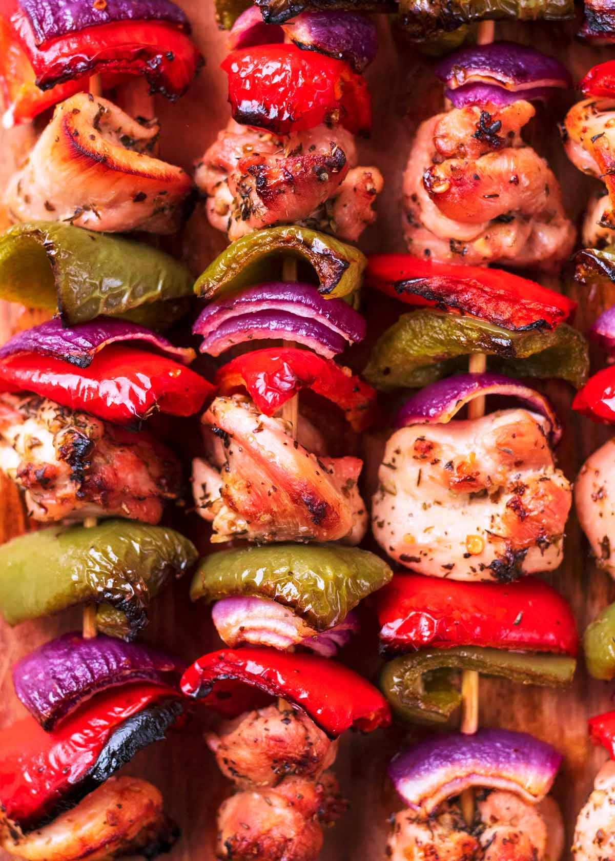 Cooked chicken and vegetable skewers.