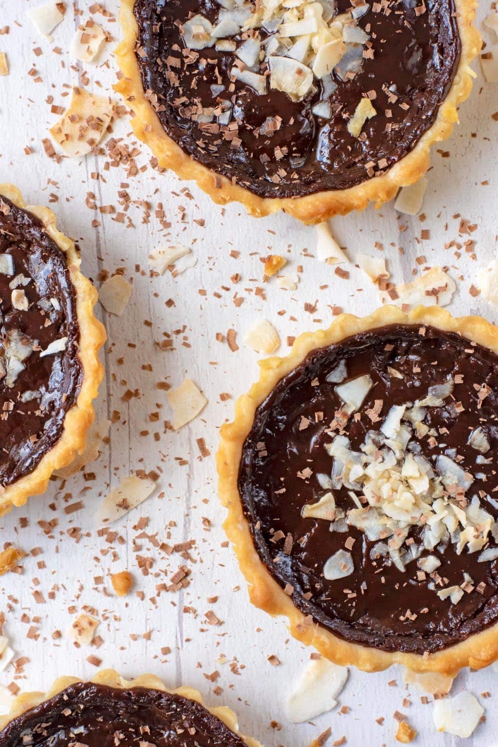 Chocolate Pies, surrounded by chocolate shavings.