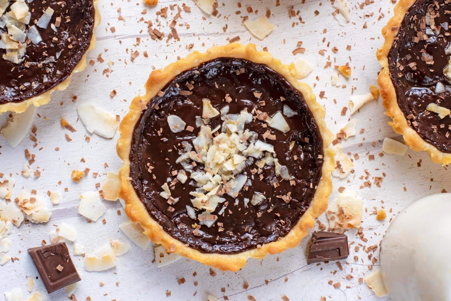 Chocolate Pie topped with coconut flakes.
