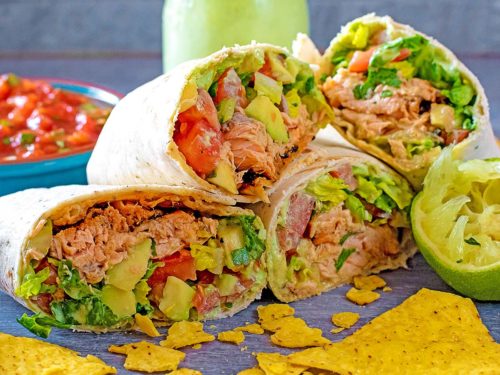 Salmon Burritos sliced in half.