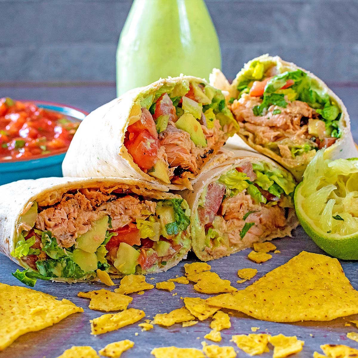 Salmon Burritos sliced in half.