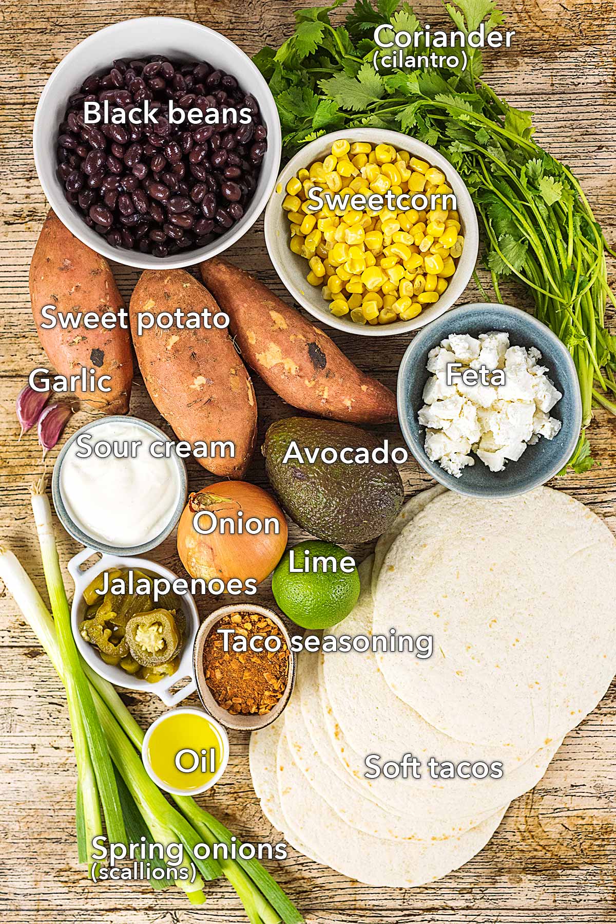 Ingredients needed to make this recipe laid out on a wooden surface.