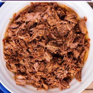 Slow Cooker Pulled Beef with a text title overlay.