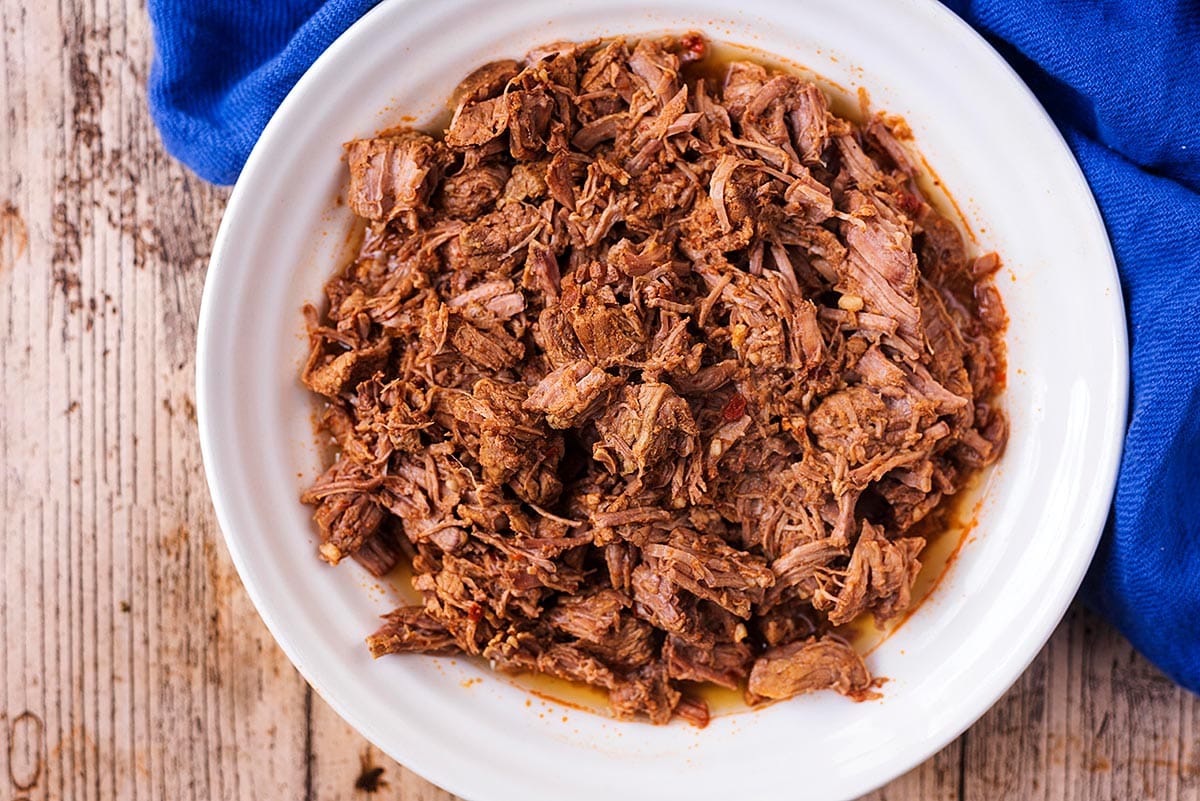 Shredded beef in a bowl.