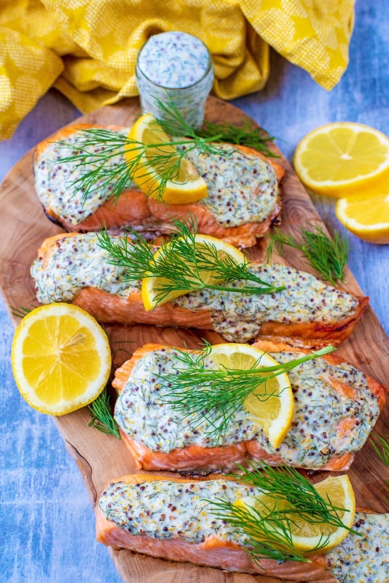 Creamy Dill Salmon on a wooden serving board.