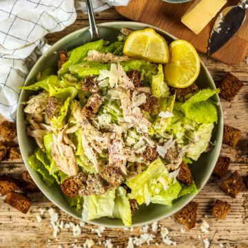 Healthy Caesar salad in a large bowl.