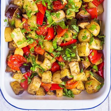 Italian Roasted Vegetables in a white baking dish.