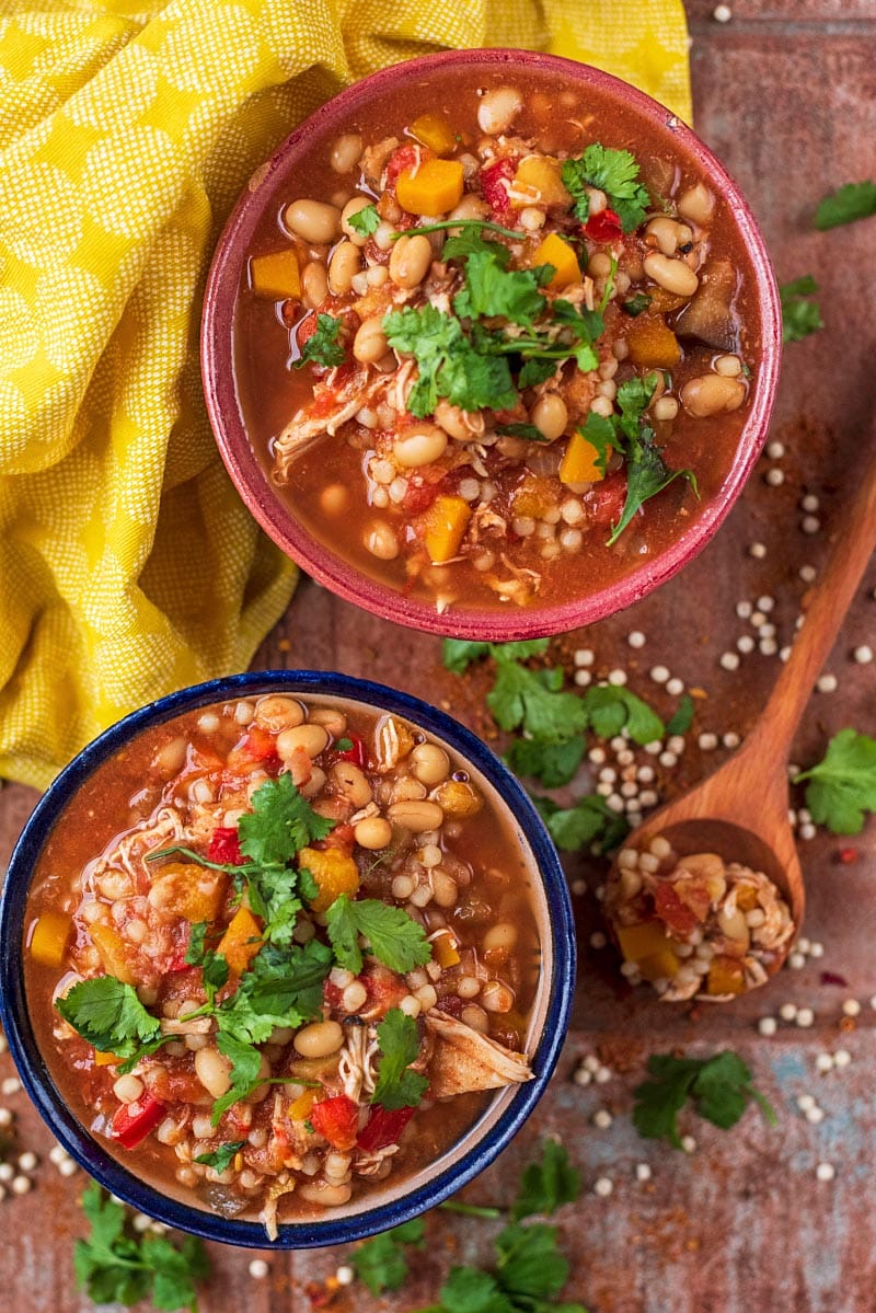 Two bowls of slow cooker Moroccan chicken.