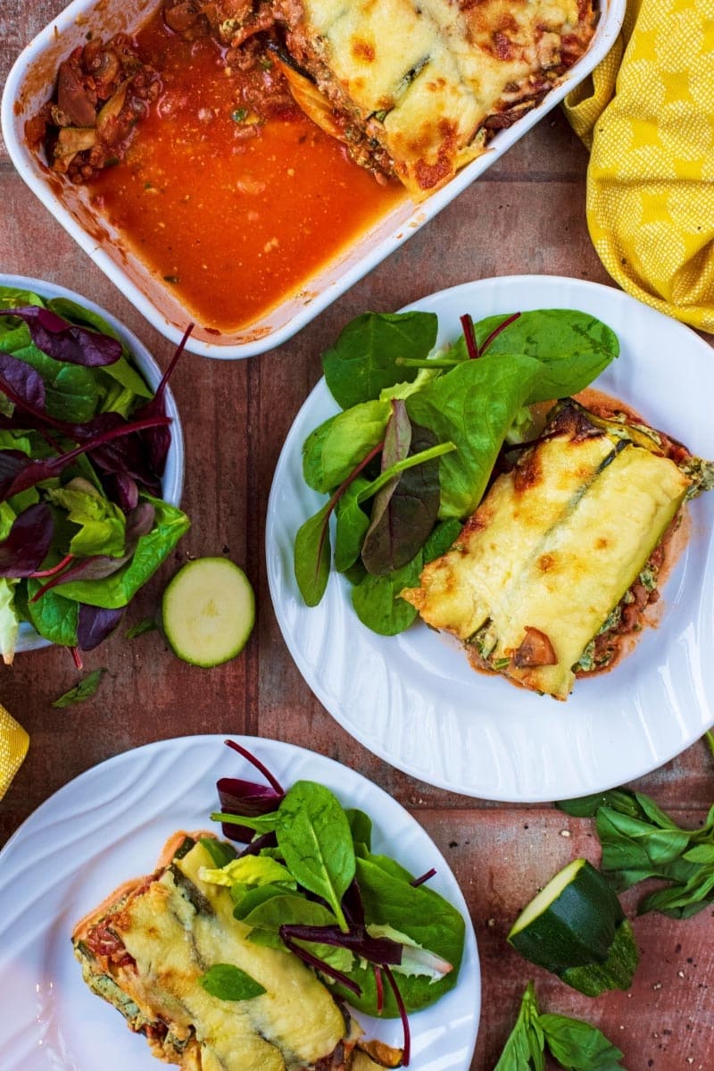 Two plates of Low Carb Lasagna with salad.