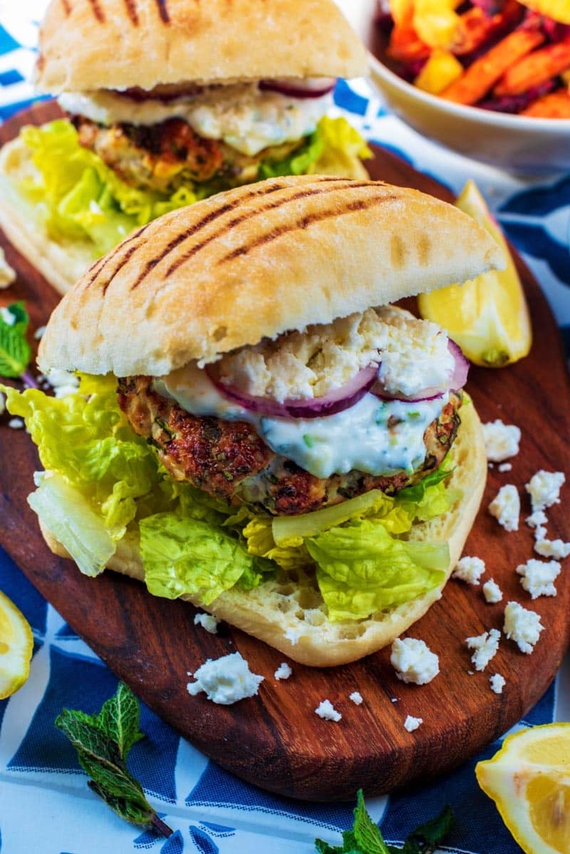 Turkey Burgers with lettuce, red onion and tzatziki.
