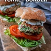 Greek turkey burger with a text overlay title.