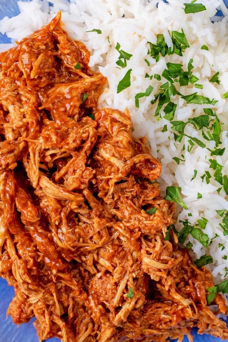 Shredded barbecue chicken with herb rice.