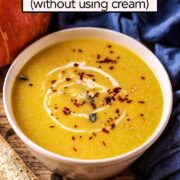 Creamy pumpkin soup with a text title overlay.