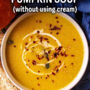 Creamy pumpkin soup with a text title overlay.