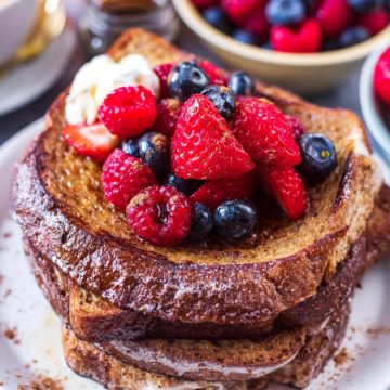 Four slices of healthy French toast with berries on top