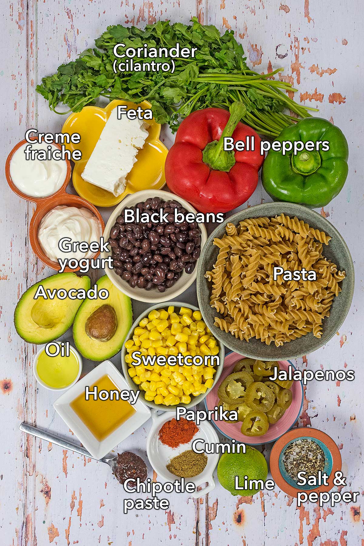 All the ingredients needed for this recipe laid out on a wooden surface with text overlay labels.