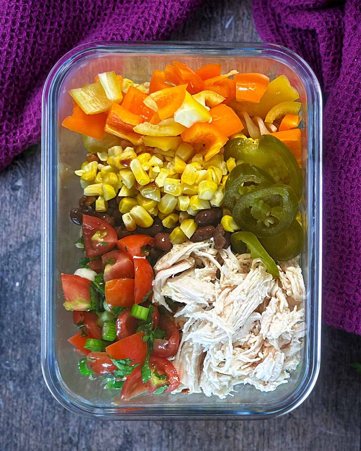Salsa added to the container.