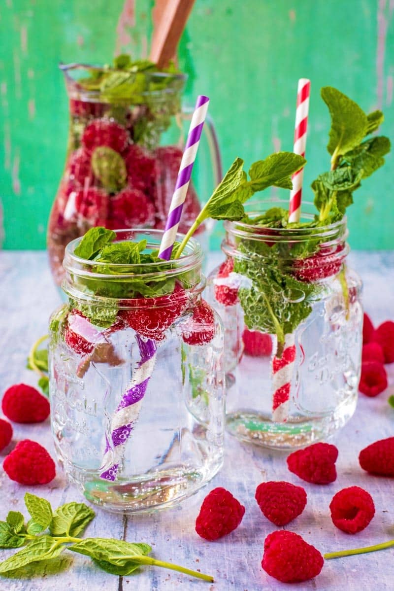 Raspberry and Mint Sparkling Water in two mason glasses