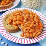 A plate of slow cooker baked beans on toast.