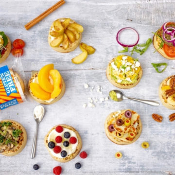 10 vegetarian crumpet toppings surrounded by spoons and food items