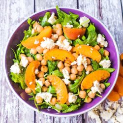 A bowl of feta and chickpea salad with apricots.