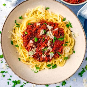 Marinara sauce on top of some spaghetti.