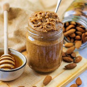 Vanilla and Honey Almond Butter in a glass jar.