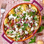 Mediterranean Potato Salad in an oval serving bowl.