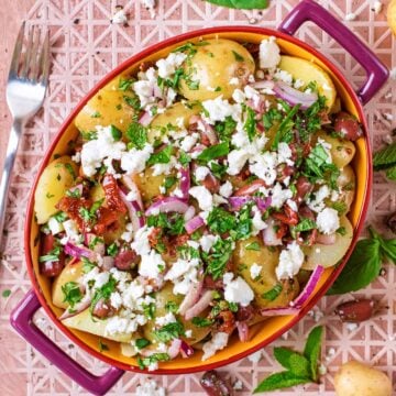 Mediterranean Potato Salad in an oval serving bowl.