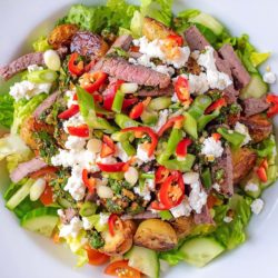 Spicy Steak Salad in a large white bowl.