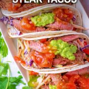 Cajun steak tacos with a text overlay title.