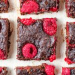 A square of chocolate raspberry brownie.