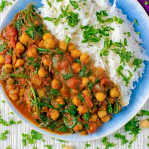 10 Minute Chickpea and Spinach Curry on a blue and white plate.