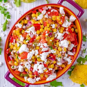 Sweetcorn salsa in an oval serving dish.