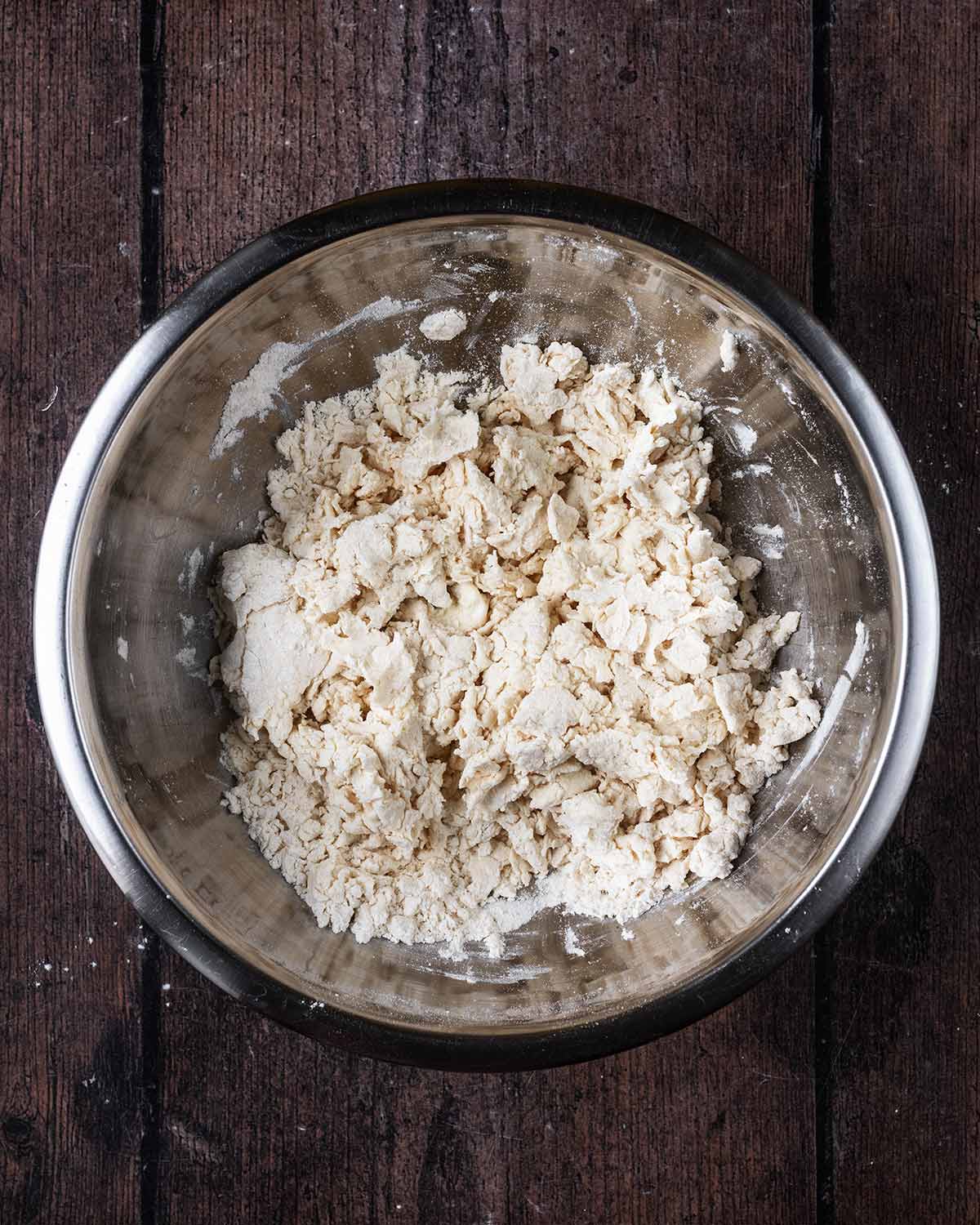 Everything mixed in the bowl to form a dough.
