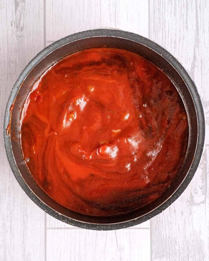 BBQ sauce cooking in a saucepan.