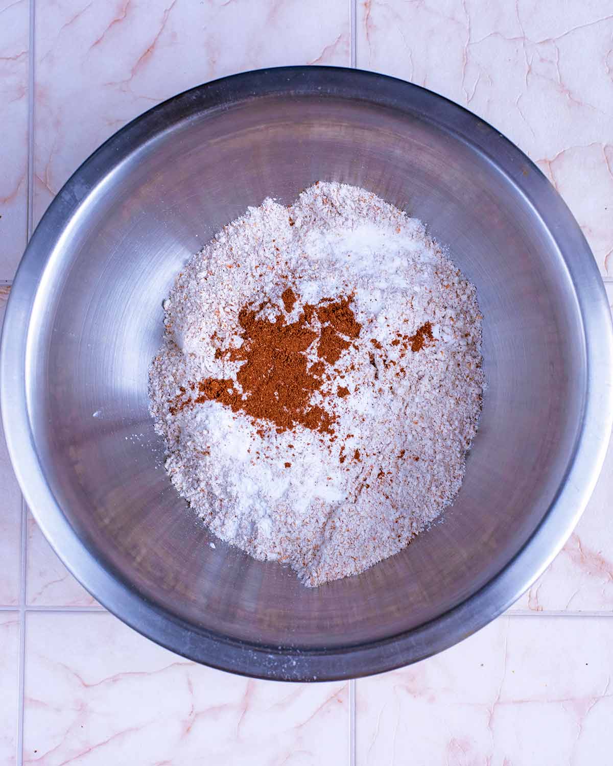 Flour, cinnamon, sweetener and baking powder in a mixing bowl.