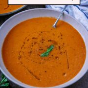 Roasted red pepper and tomato soup with a text overlay title.