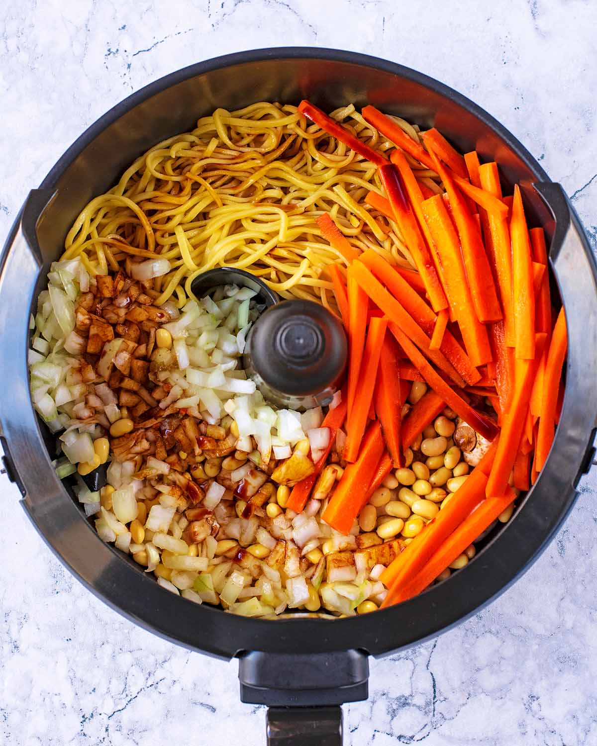Airfryer bowl with Chinese Noodles ingredients.