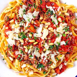 Tomato and basil pasta topped with pine nuts.