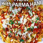 Tomato and basil pasta with a text overlay title.