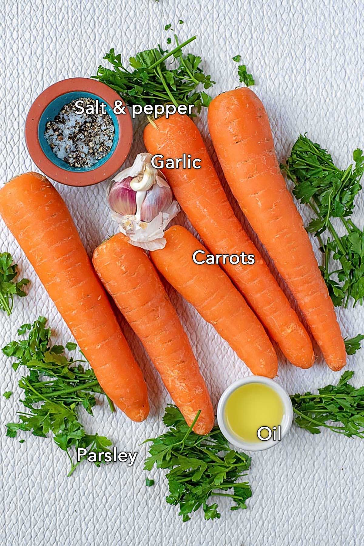 All the ingredients needed for this recipe laid out on a white surface and labelled with text overlay.