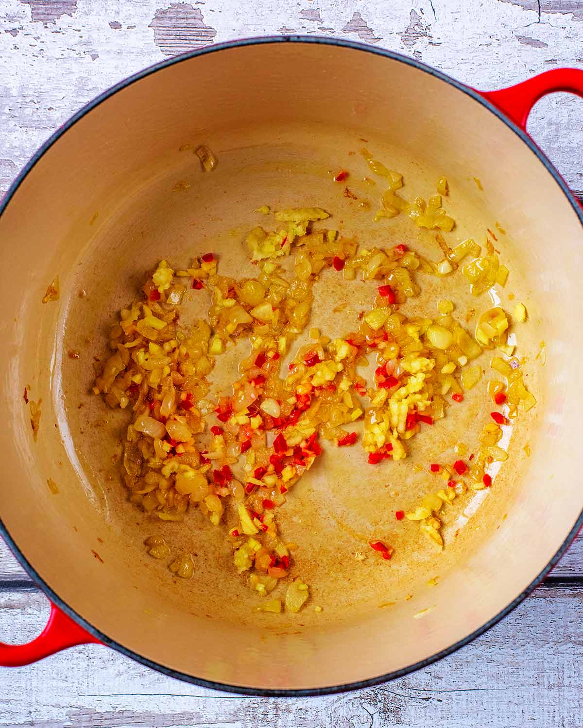 Chilli, garlic and ginger added to the pan.