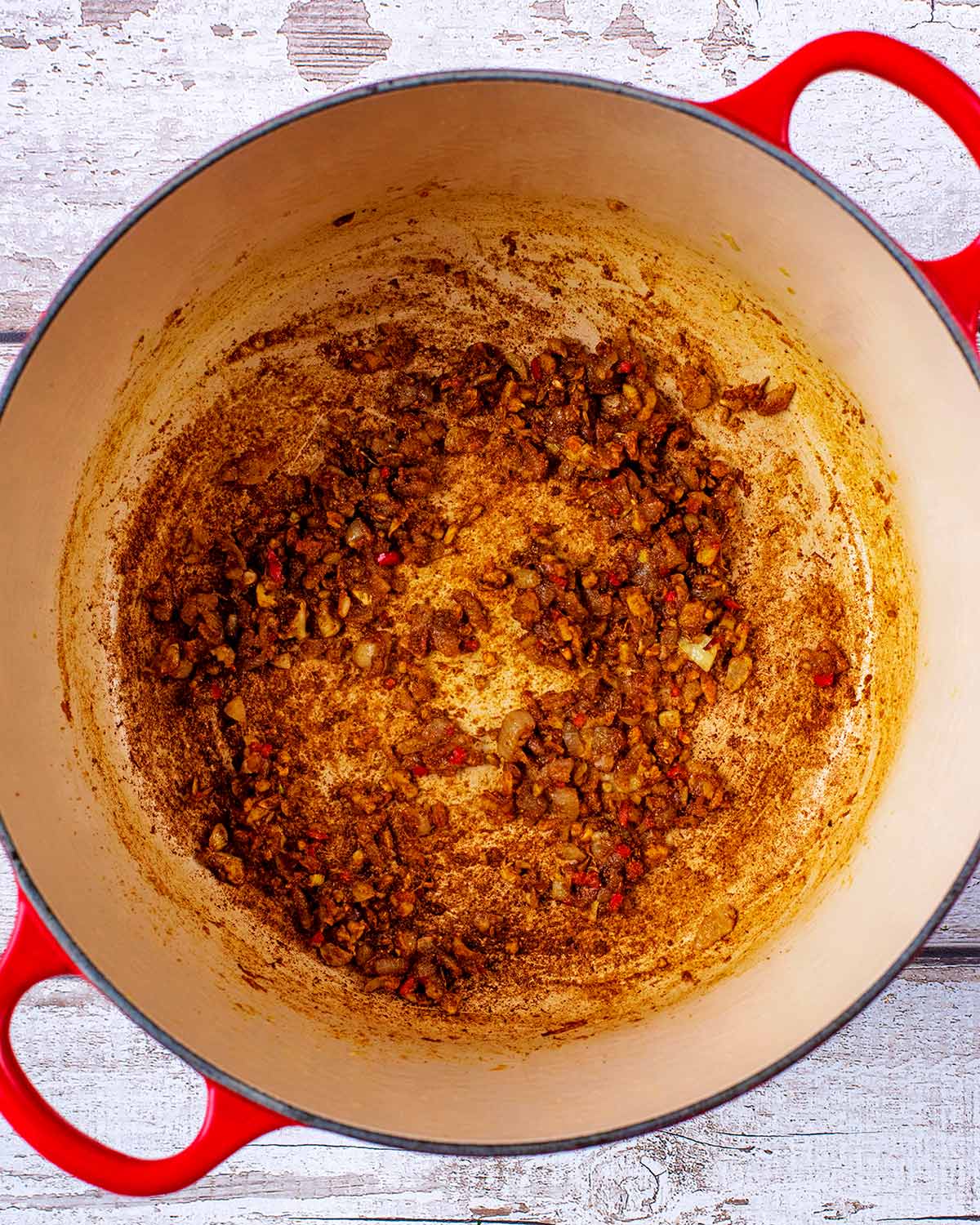 Spices added to the pan.
