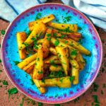 Honey Roasted Parsnips on a blue plate.