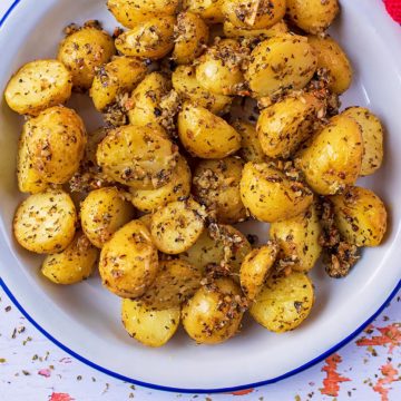 Roasted Parmesan Potatoes in a metal serving dish