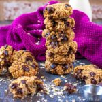 A stack of 2 Ingredient Cookies in front of a purple towel.